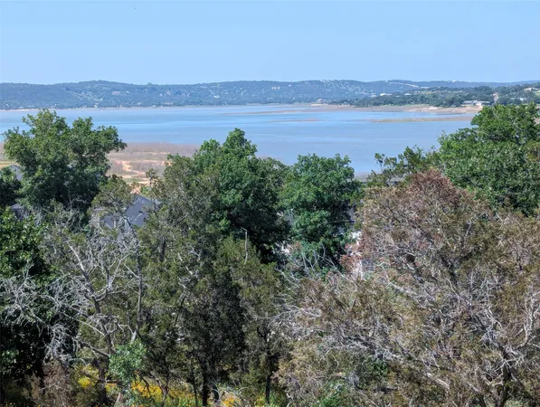 a view of a lake with outdoor space