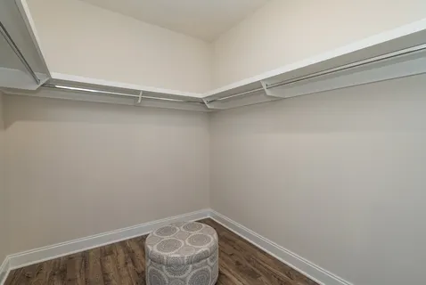 a view of an empty walk in closet
