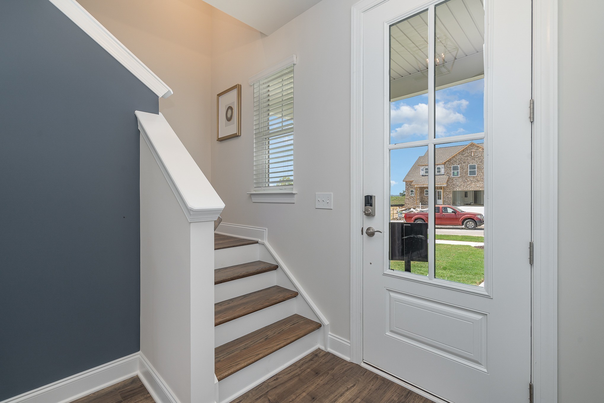 3144 Arbor Vly Road, Unit H8 Spring Hill, TN 37174 - Photo 19 of 32 a view of a staircase with white walls and windows