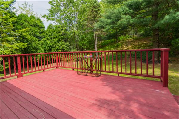 930 Central Avenue Needham, MA 02492 - Photo 19 of 21 a view of a deck with a yard and wooden fence