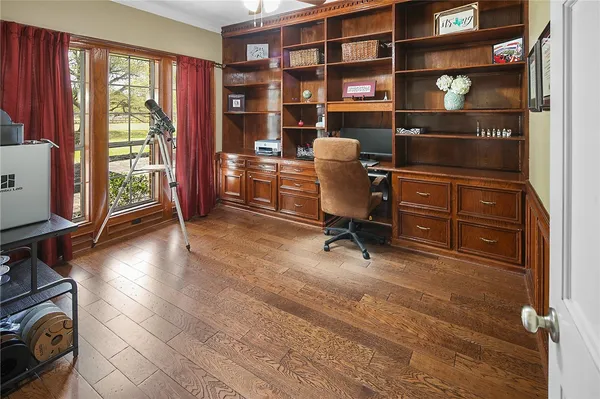 a kitchen with stainless steel appliances kitchen island granite countertop a stove a sink and a microwave