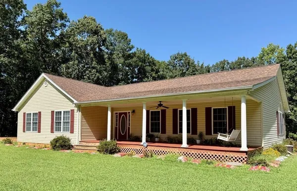 front view of a house with a yard
