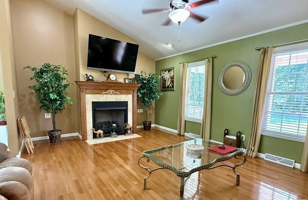 100 Flamingo Road Bassett, VA 24055 - Photo 12 of 30 a living room with furniture and a fireplace