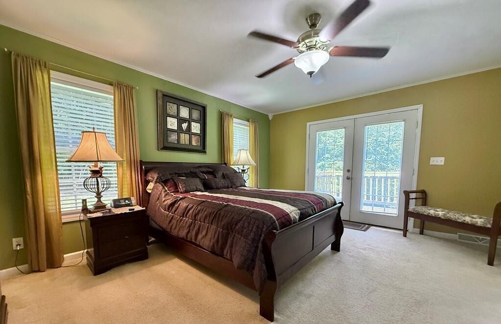 100 Flamingo Road Bassett, VA 24055 - Photo 20 of 30 a bed sitting in a spacious bedroom next to a window