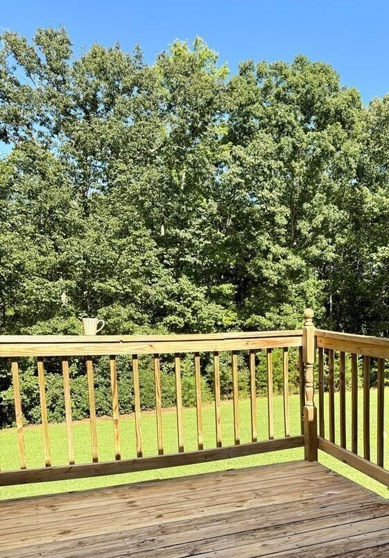 100 Flamingo Road Bassett, VA 24055 - Photo 26 of 30 a view of a brick house with a yard