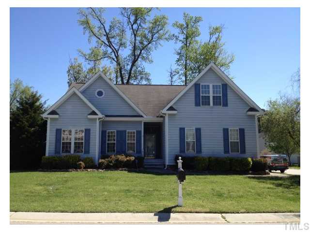 8700 Neuse Village Court Raleigh, NC 27616 - Photo 1 of 11 a front view of a house with a yard