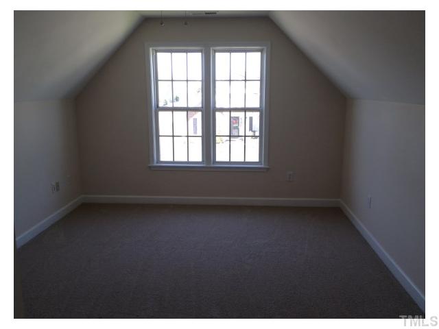 8700 Neuse Village Court Raleigh, NC 27616 - Photo 9 of 11 an empty room with a window