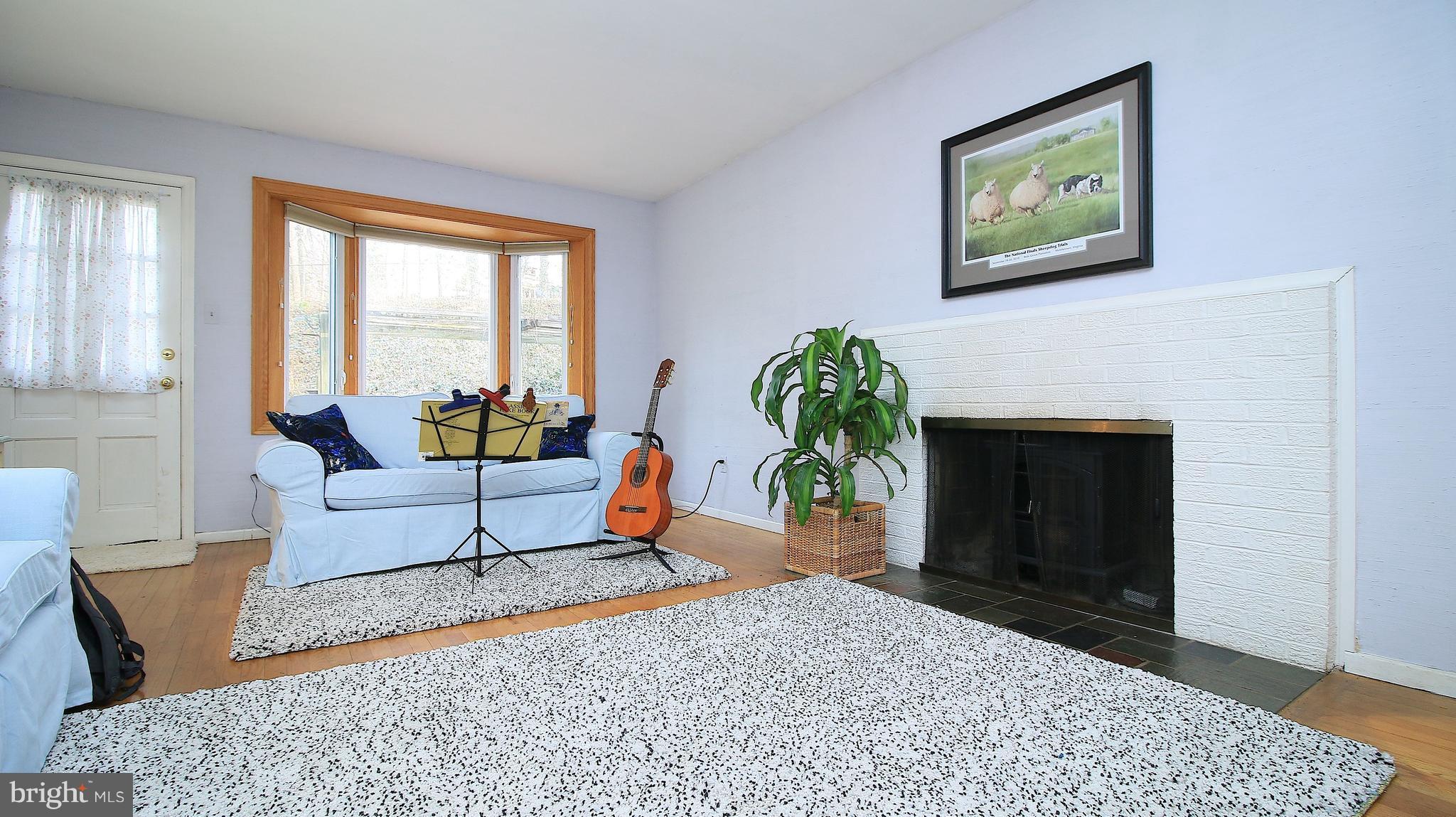 9709 Rhapsody Drive Vienna, VA 22180 - Photo 10 of 26 FAMILY ROOM FEATURES WB FIREPLACE AND BAY WINDOW
