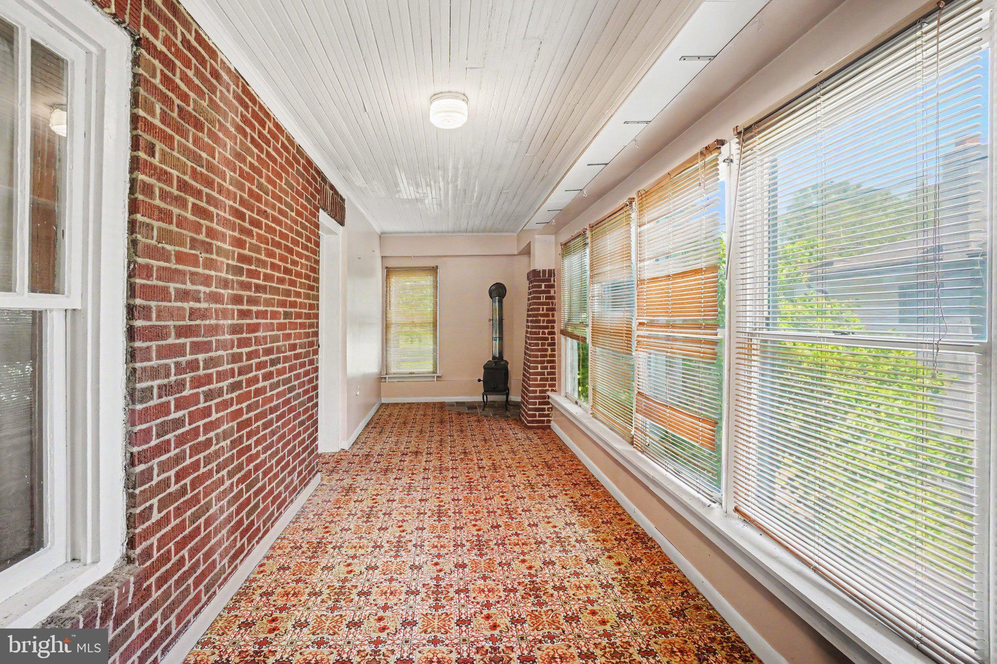 225 Garfield Road Bernville, PA 19506 - Photo 22 of 37 Sunroom - Wood Stove