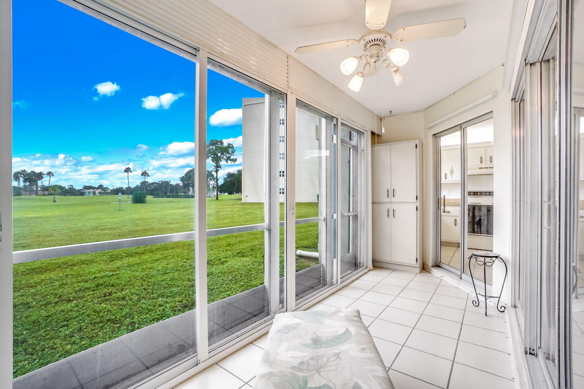 3951 Via Poinciana, Unit 114 Lake Worth, FL 33467 - Photo 11 of 34 a view of an entryway with a garden