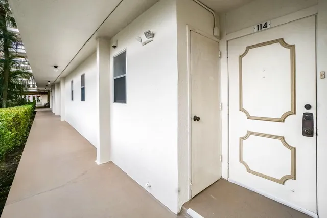a view of a hallway with hallway and closet