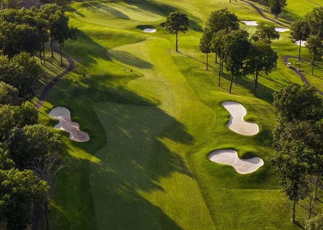 a view of swimming pool with outdoor seating