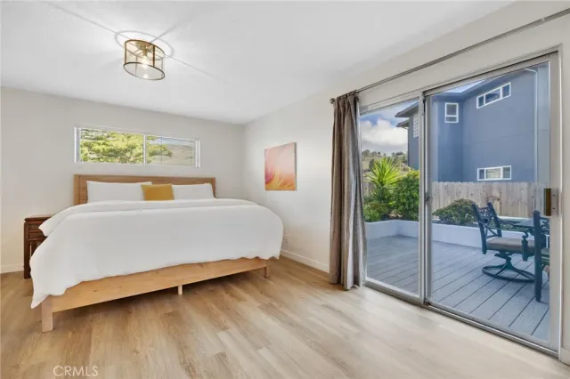 a bedroom with a bed and a table