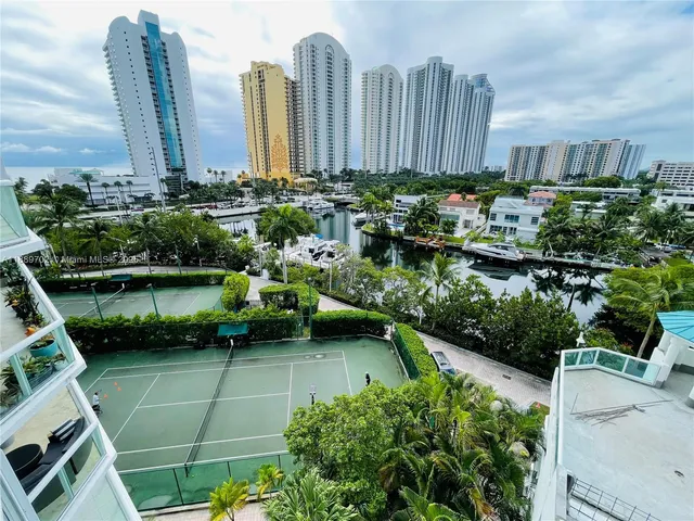 a view of a city with tall buildings