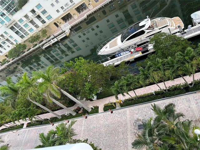 a backyard of a building with lots of green space