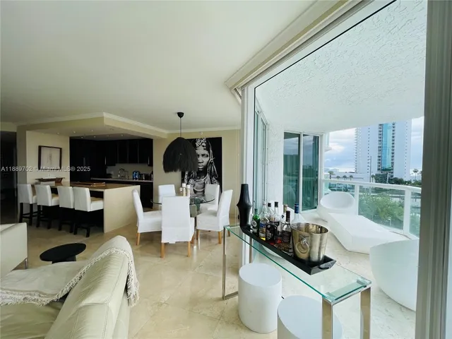 a living room with fireplace furniture and a flat screen tv