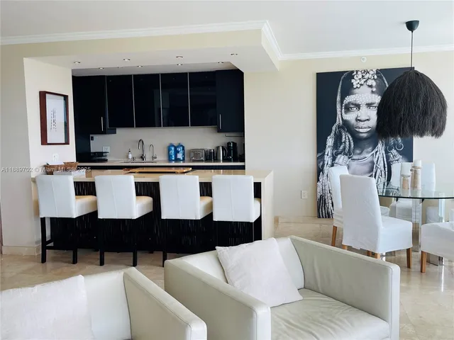 a living room with furniture and window