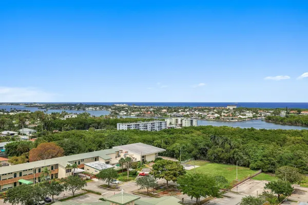 a view of a city with a garden