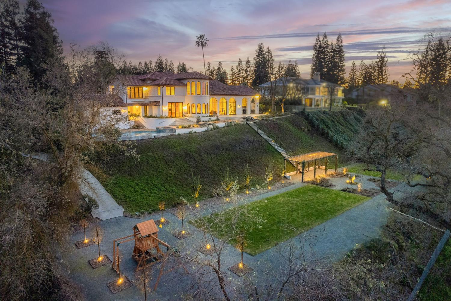 1530 West Moraga Road Fresno, CA 93711 - Photo 11 of 11 an aerial view of a house with a swimming pool