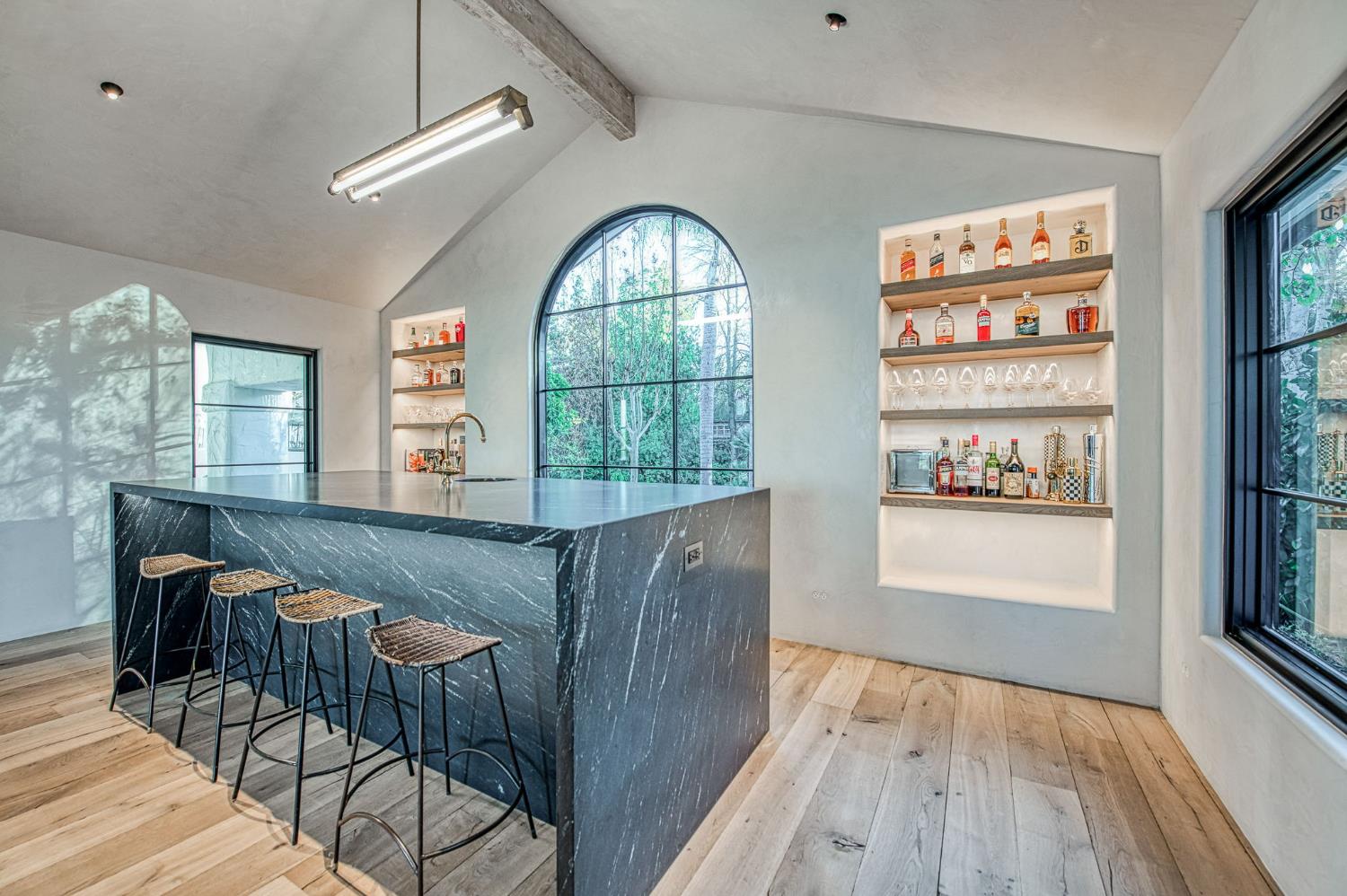 1530 West Moraga Road Fresno, CA 93711 - Photo 4 of 11 a view of a livingroom with furniture wooden floor and windows