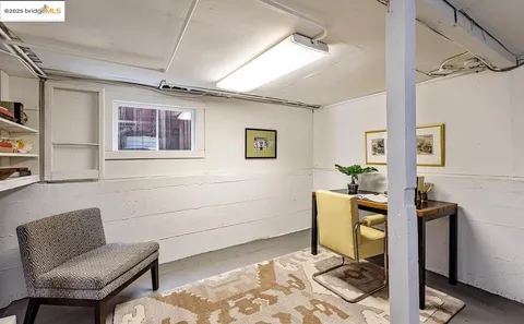 a workspace with furniture and window