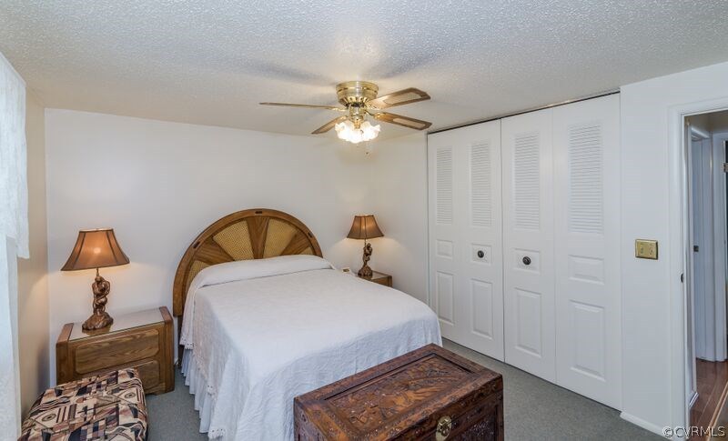 315 Buffalo Road Richmond, VA 23223 - Photo 11 of 24 The master bedroom has a ceiling fan, double door
