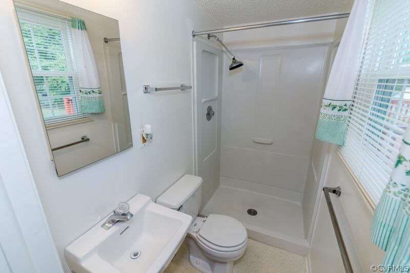 315 Buffalo Road Richmond, VA 23223 - Photo 13 of 24 Master bath offers a large shower and a window all