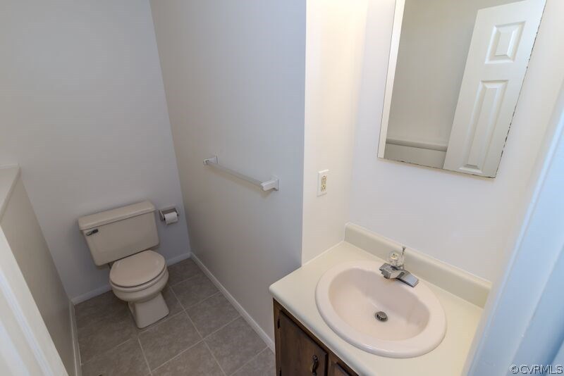 315 Buffalo Road Richmond, VA 23223 - Photo 20 of 24 Half balf bath on the bottom floor for added conve
