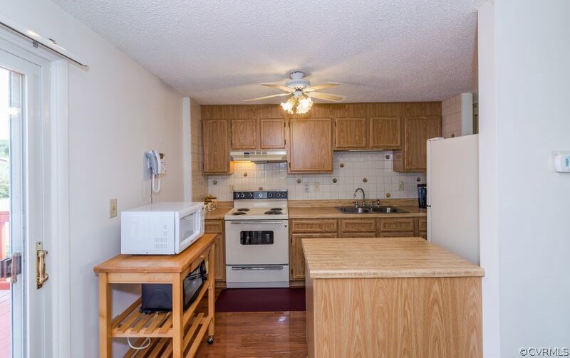 View from the dining space into the kitchen.  You