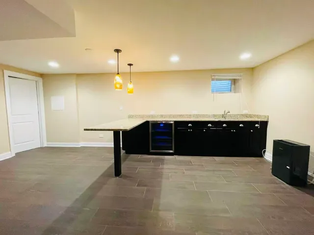 a bathroom with a bathtub and a sink