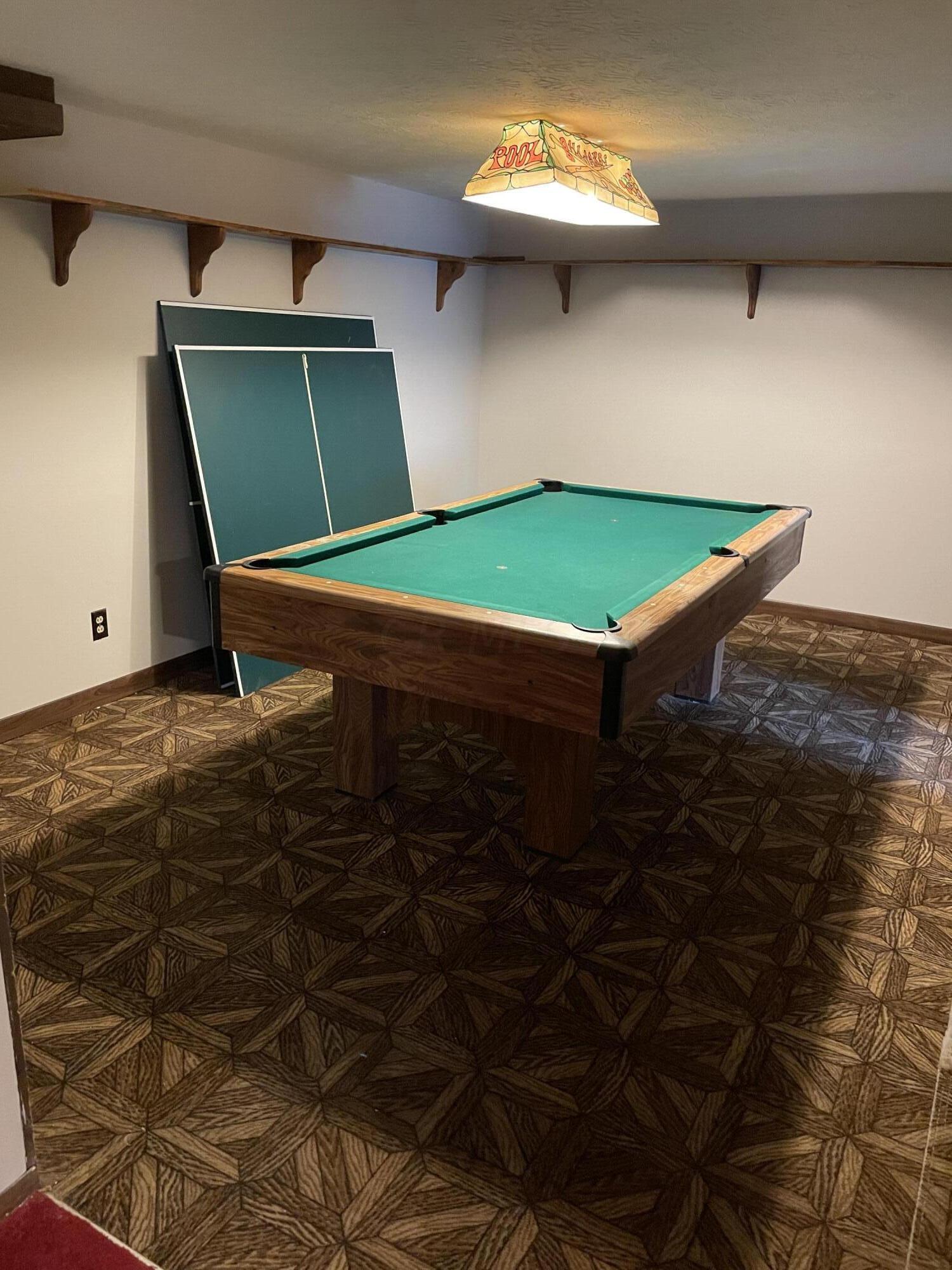 33 Main Road Delaware, OH 43015 - Photo 23 of 30 Portion of room has new drywall. Pool table and ping-pong table is included with the sale of home.