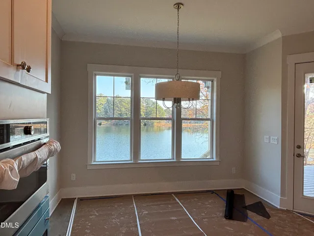 a room with windows and view of outdoor space