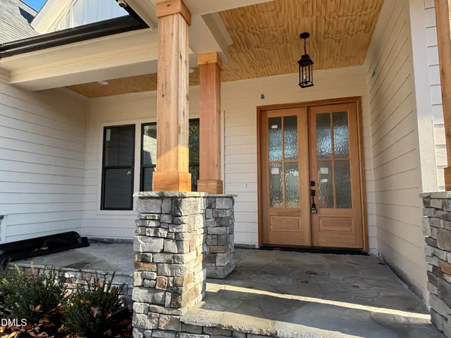 a front view of a house with a shower
