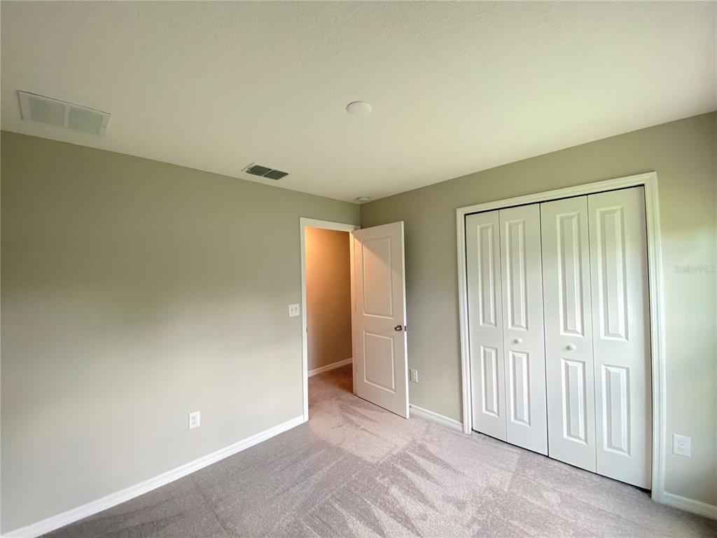 2530 Southwest 167th Loop Ocala, FL 34473 - Photo 20 of 31 an empty room with closet area