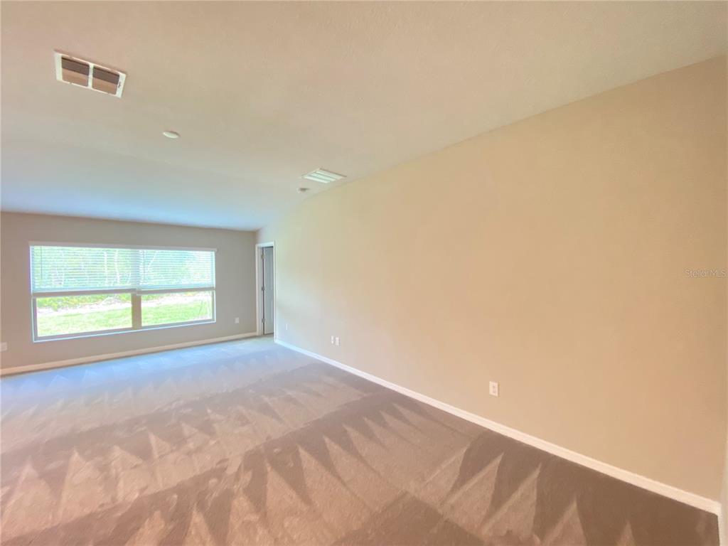 2530 Southwest 167th Loop Ocala, FL 34473 - Photo 23 of 31 a view of an empty room with a window