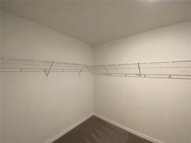 a view of a room with racks on the wall
