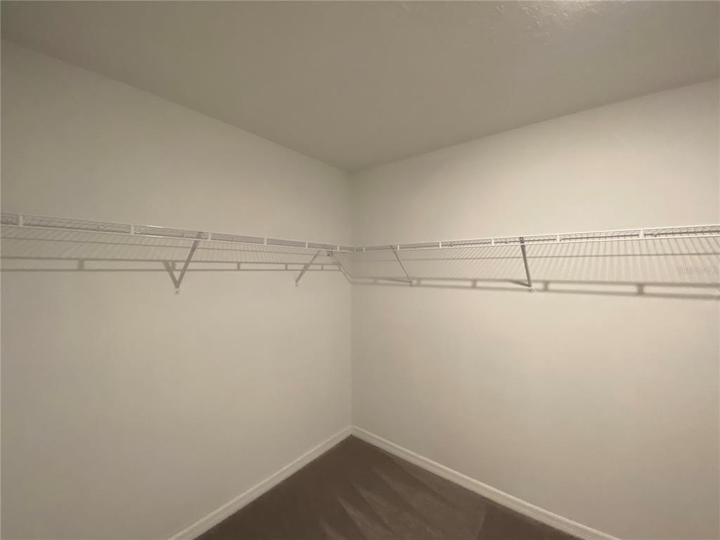 2530 Southwest 167th Loop Ocala, FL 34473 - Photo 25 of 31 a view of a room with racks on the wall