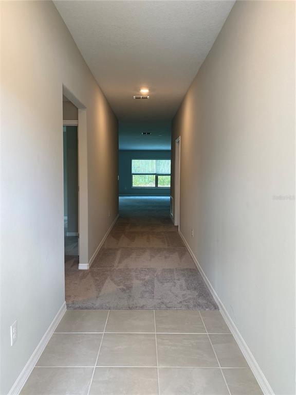 2530 Southwest 167th Loop Ocala, FL 34473 - Photo 8 of 31 a view of hallway with window