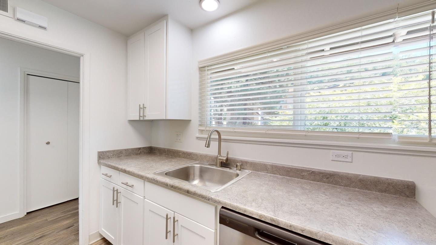 109 Professional Center Parkway San Rafael, CA 94903 - Photo 15 of 16 a kitchen with granite countertop a sink and a window