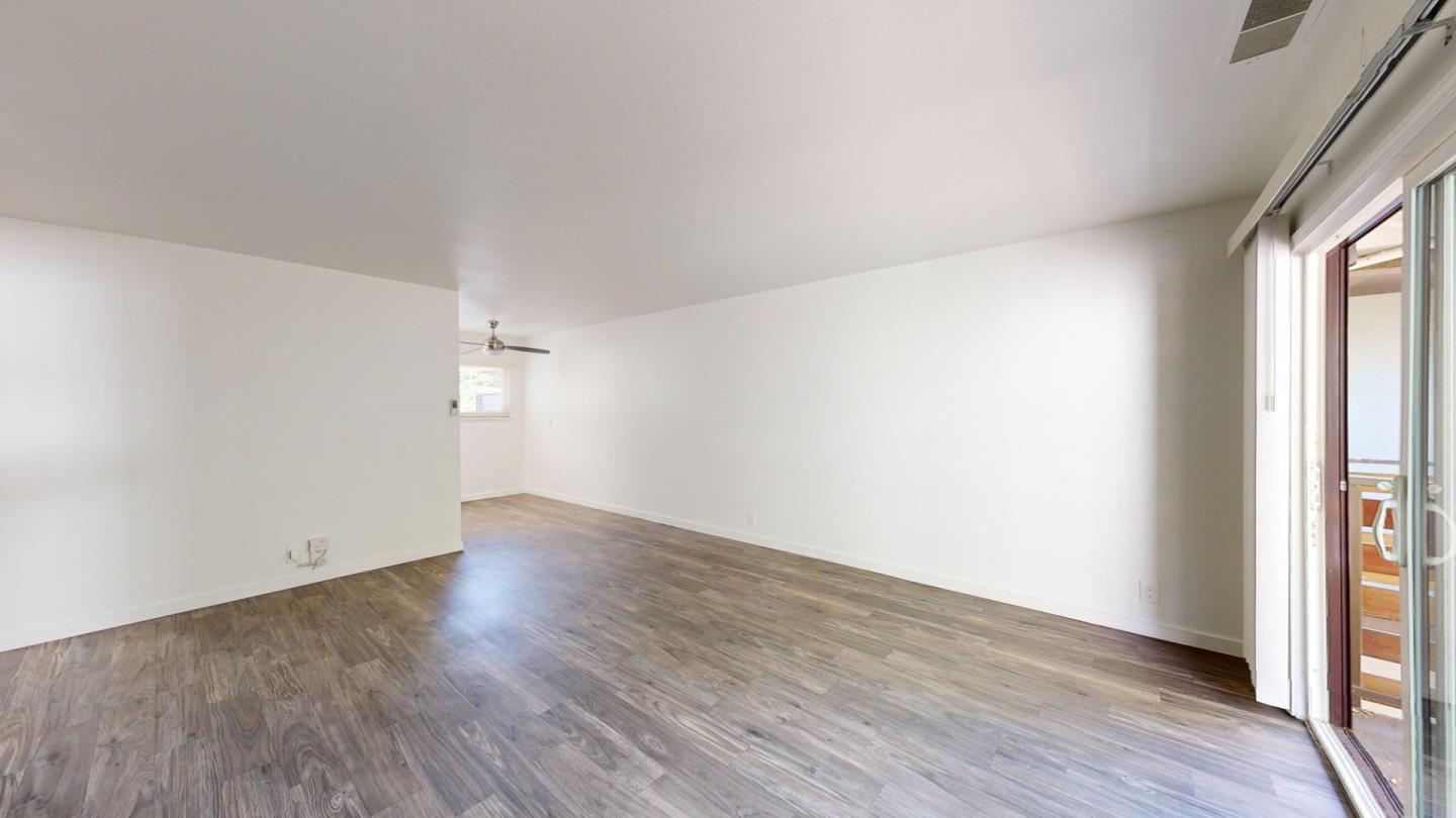 109 Professional Center Parkway San Rafael, CA 94903 - Photo 6 of 16 an empty room with wooden floor and windows