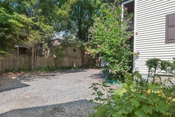 a backyard of a house with lots of green space