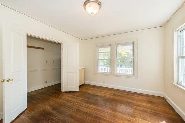 a view of livingroom with hardwood floor and window