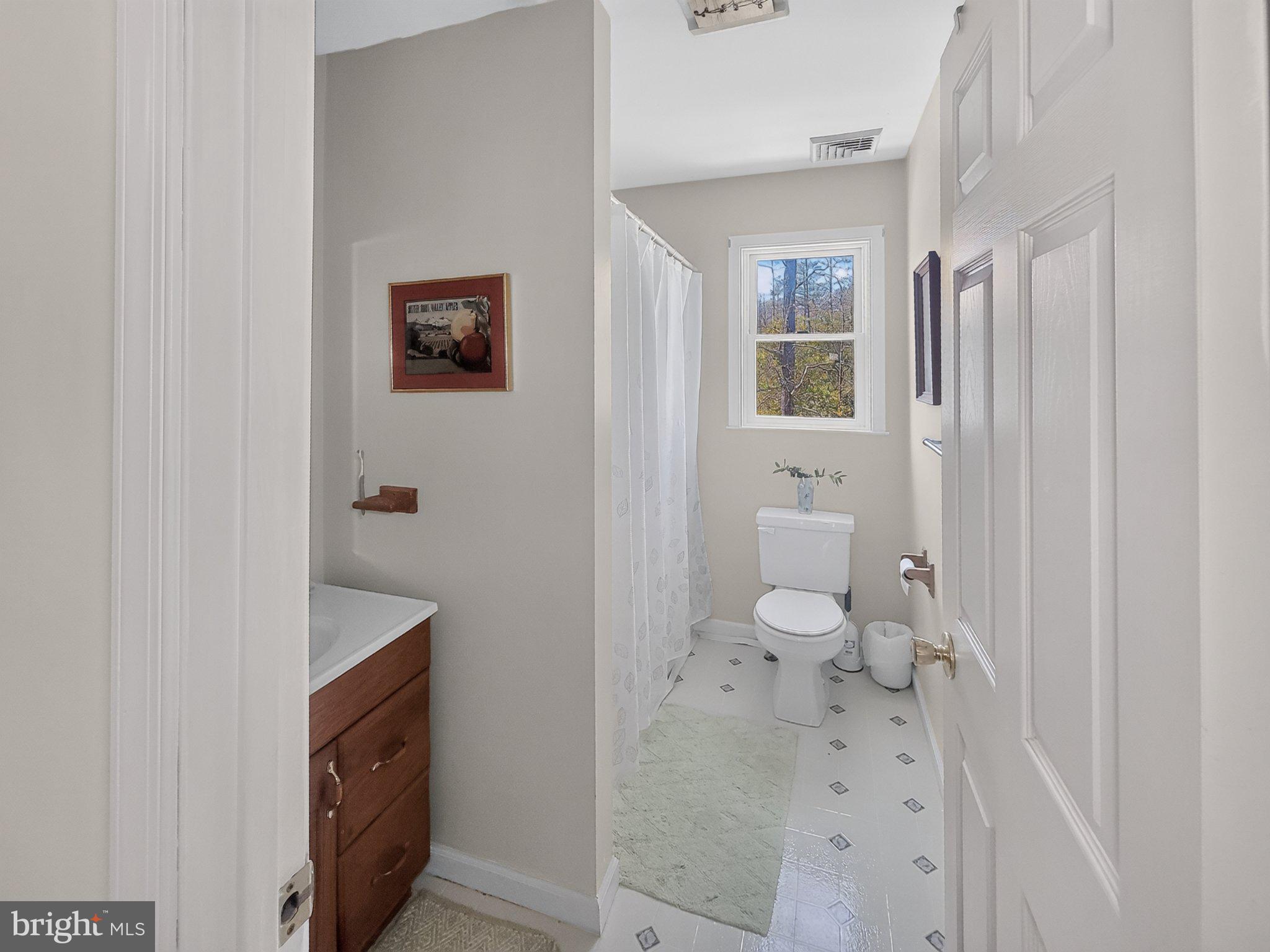 5214 David Greene Road Cambridge, MD 21613 - Photo 30 of 73 Bright and airy bathroom retreat.
