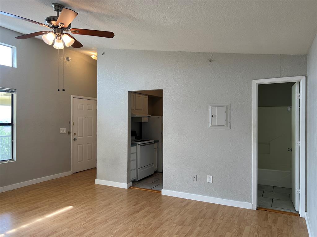 701 West Sycamore Street, Unit 303 Denton, TX 76201 - Photo 5 of 12 Here is another view of the living room.