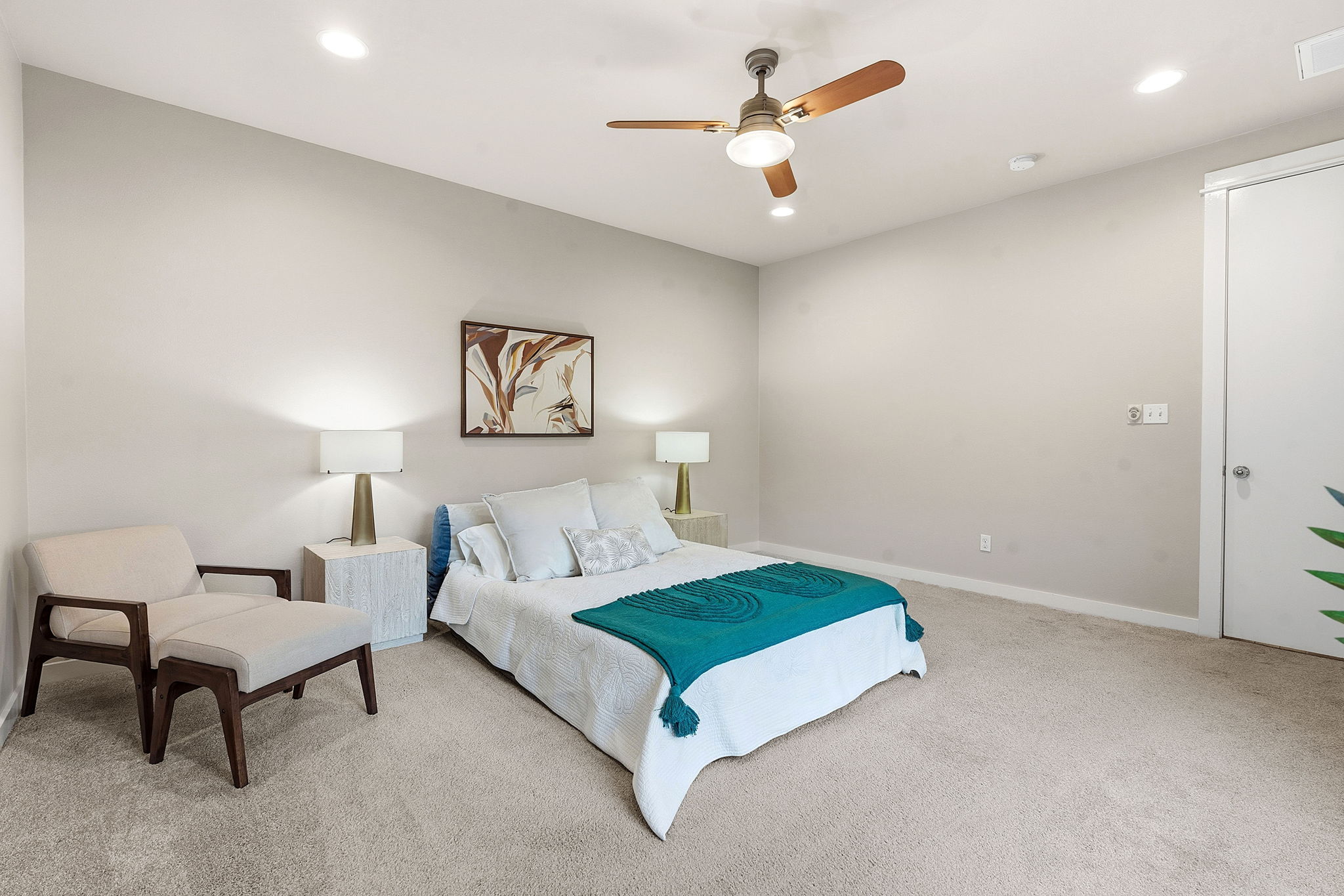 2911 Corbin Lane Austin, TX 78704 - Photo 12 of 37 a spacious bedroom with a bed and a chandelier