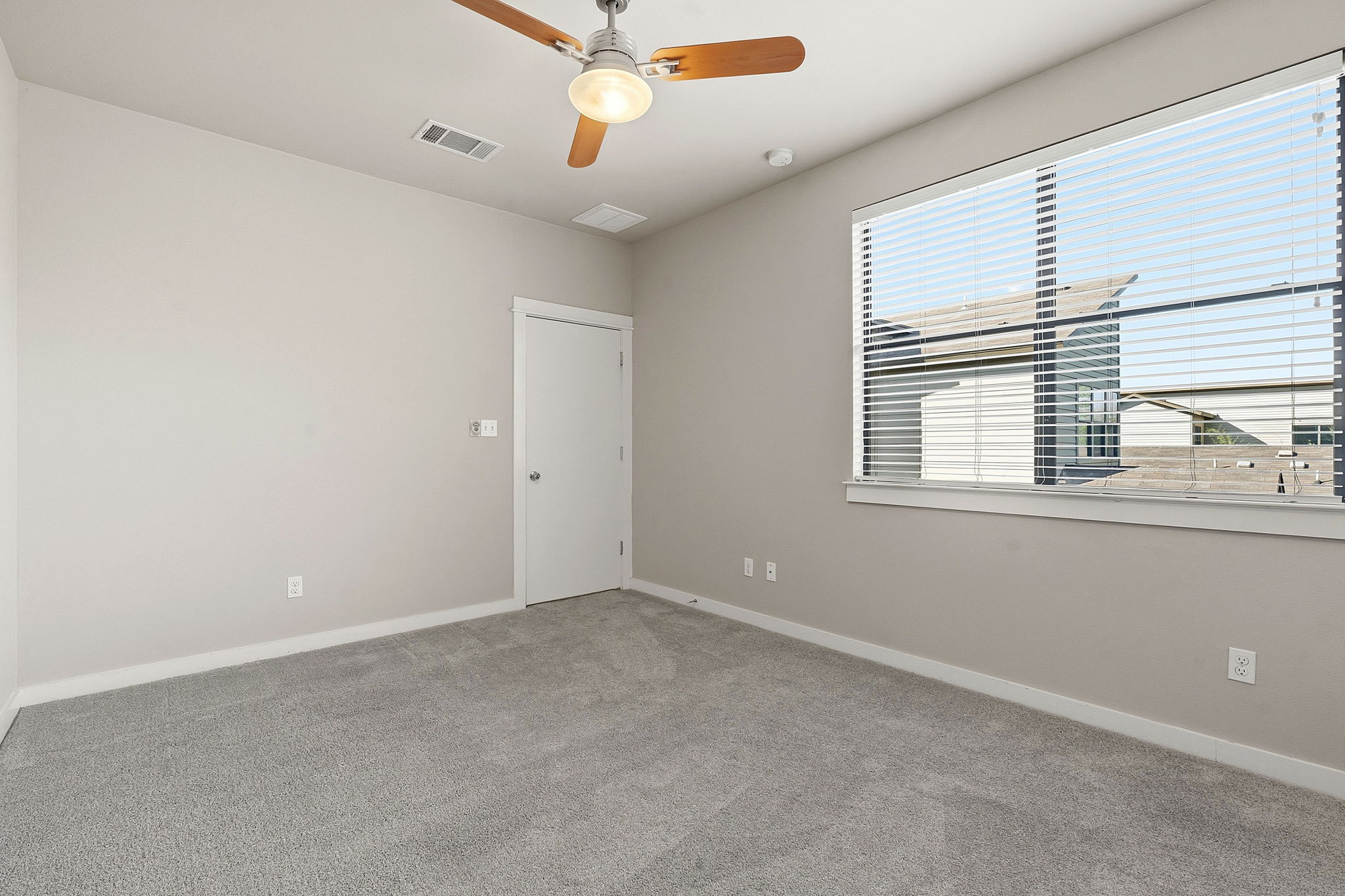 2911 Corbin Lane Austin, TX 78704 - Photo 20 of 37 a view of an empty room with a window