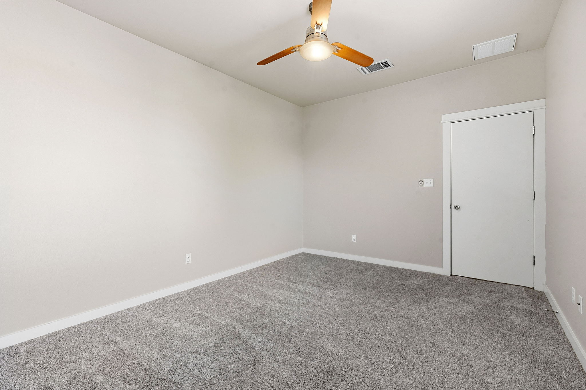 2911 Corbin Lane Austin, TX 78704 - Photo 22 of 37 an empty room with a chandelier fan and closet
