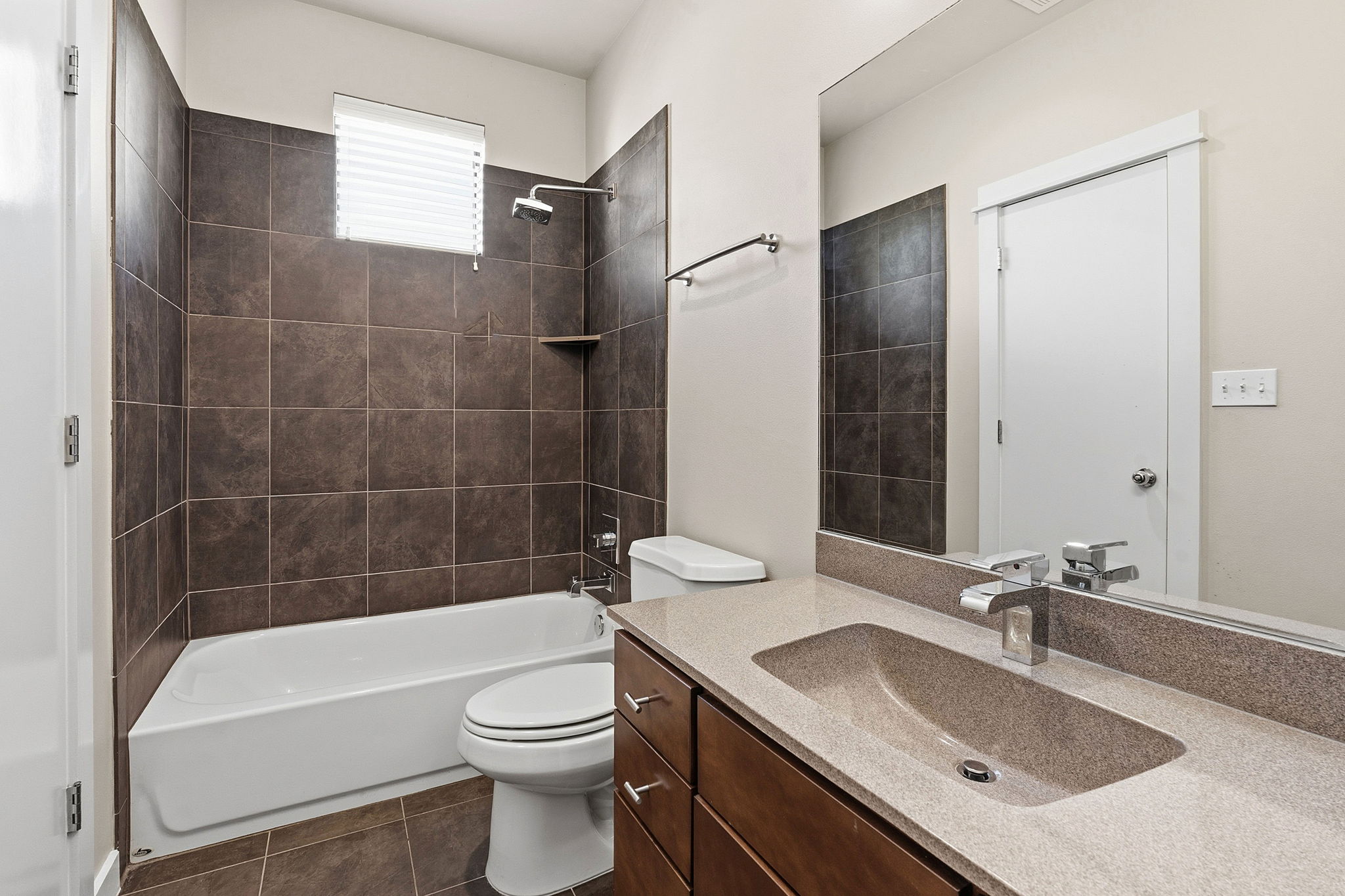 2911 Corbin Lane Austin, TX 78704 - Photo 23 of 37 a bathroom with a sink a toilet and shower