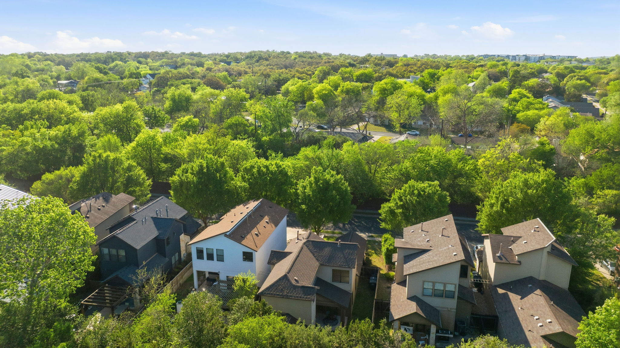 2911 Corbin Lane Austin, TX 78704 - Photo 31 of 37 an aerial view of residential houses with outdoor space and trees