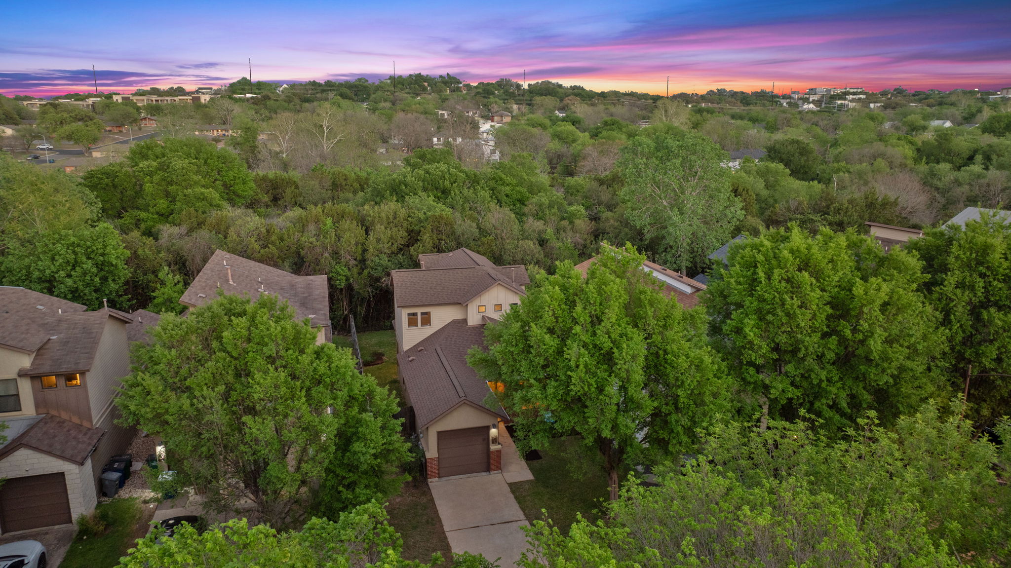 2911 Corbin Lane Austin, TX 78704 - Photo 32 of 37 an aerial view of residential houses with outdoor space and trees